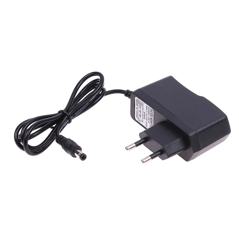 EU Plug Reverse Polarity Charger Adaptor AC 100V-240V Converter Negative Inside Switch AC DC 9V 1A 1000ma Power Adapter Supply Peaceful Pleasures Health and Wellness