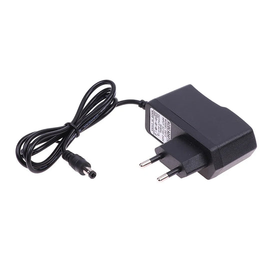EU Plug Reverse Polarity Charger Adaptor AC 100V-240V Converter Negative Inside Switch AC DC 9V 1A 1000ma Power Adapter Supply Peaceful Pleasures Health and Wellness