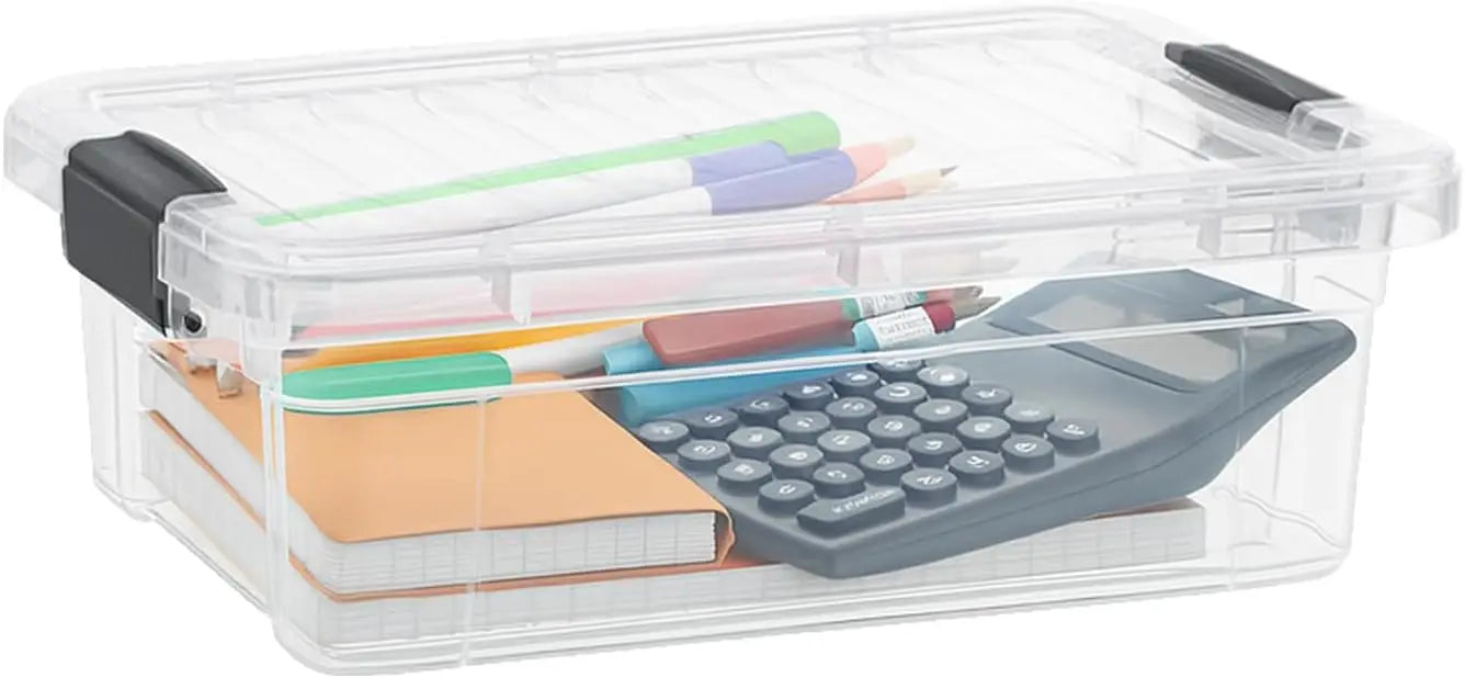 Clear storage box with office supplies including a calculator, notebooks, and pens.