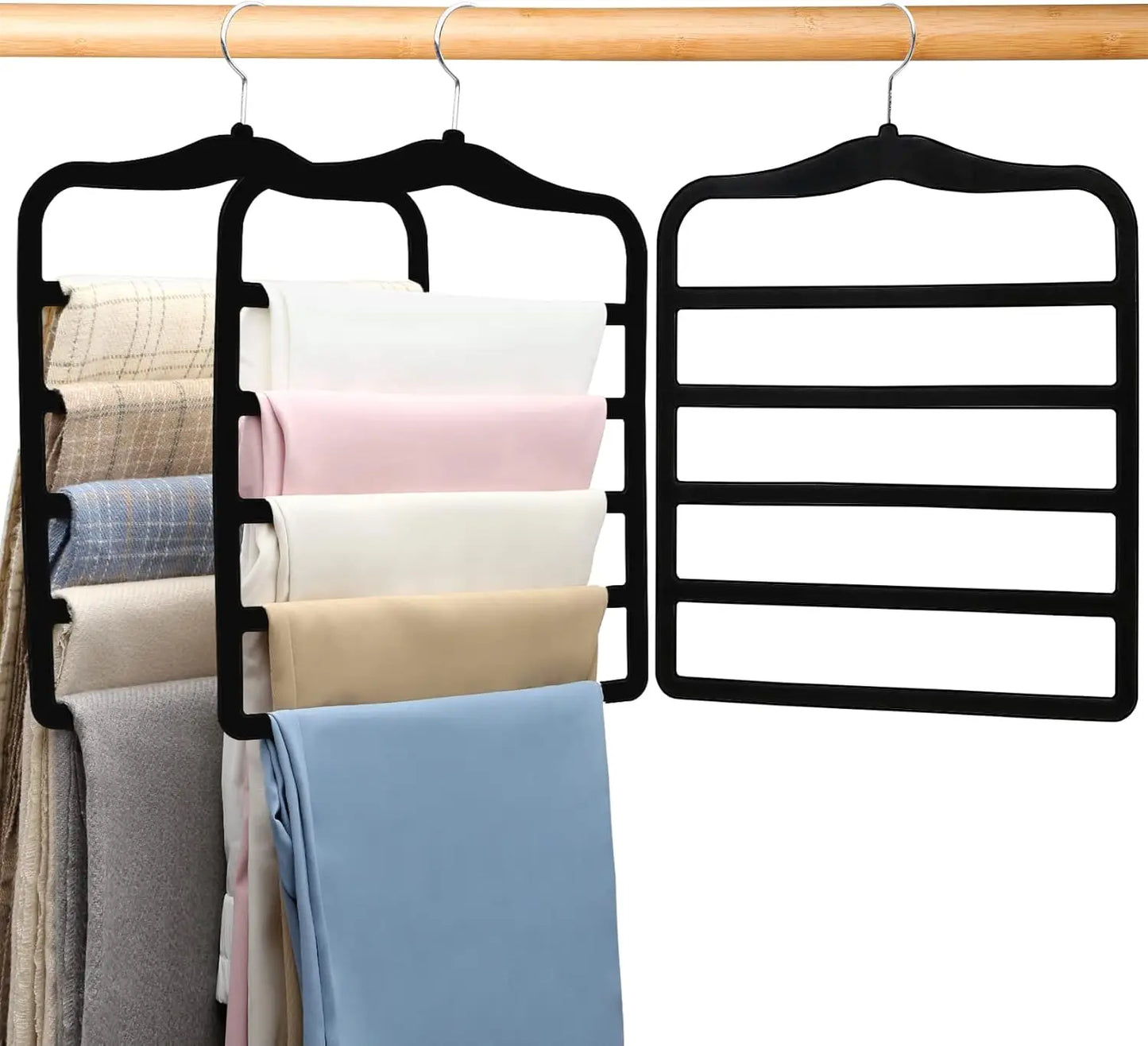 Black multi-shelf hanger with folded clothes on a wooden rod