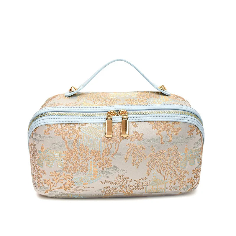 Hot Chinese Style Embroidered Makeup Bag for Women, New Ins Large Capacity Commuting Storage Bag, High-end Handheld Wash Bag Peaceful Pleasures Health and Wellness Blue