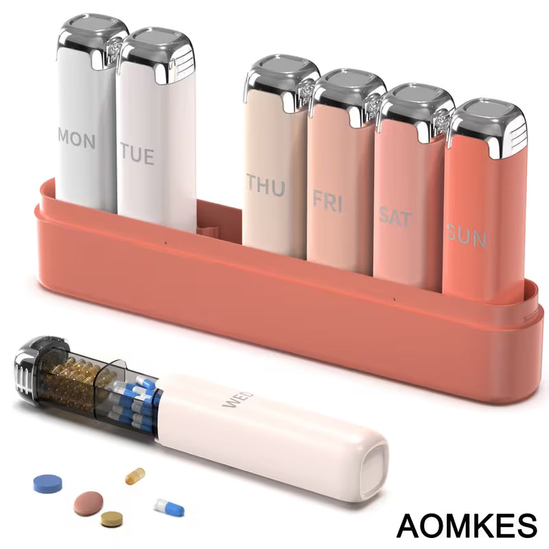 Weekly pill organizer with compartments labeled for each day of the week, featuring a pink container and white pill case.