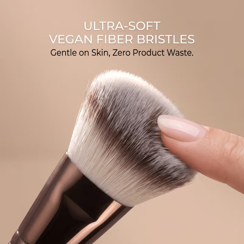 Makeup brush with ultra-soft vegan fiber bristles on a beige background