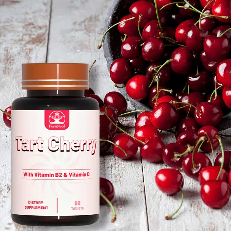 Supplement bottle labeled 'Tart Cherry' with vitamin B2 and D, surrounded by tart cherries on a wooden surface.