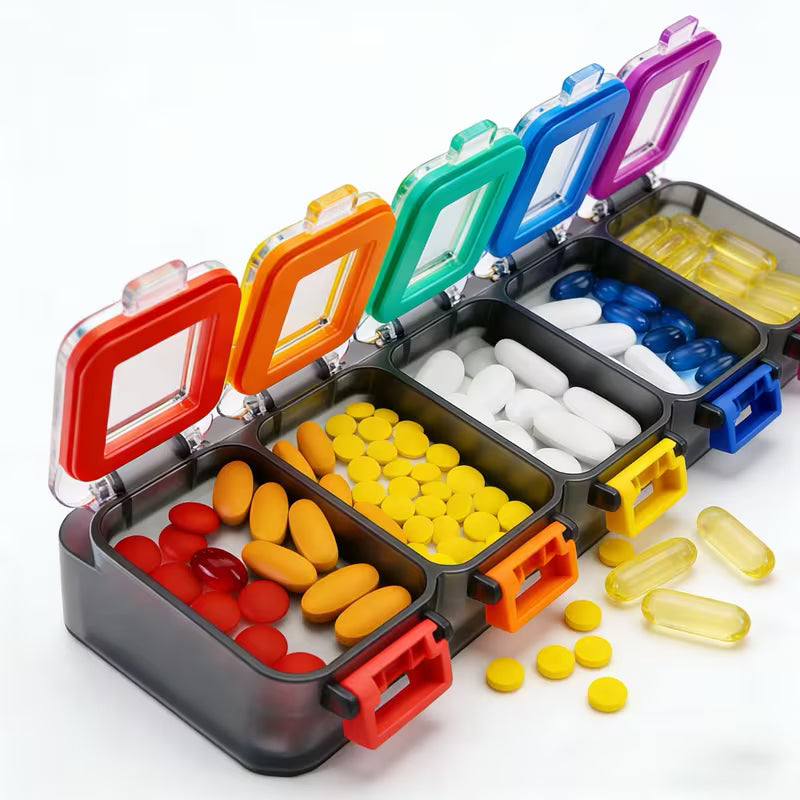 Colorful pill organizer with various colored pills on a white background