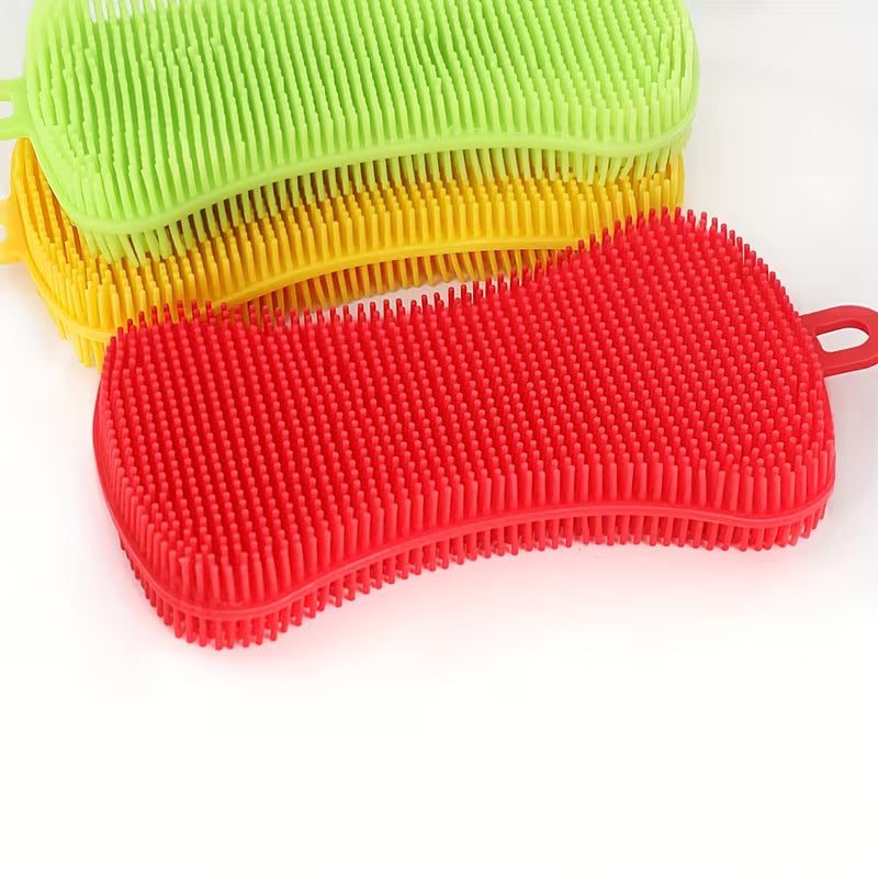 Three colorful silicone scrubbers stacked on a white background