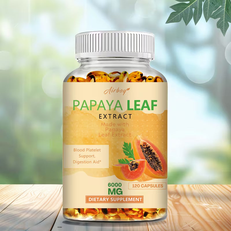 Supplement bottle labeled 'Papaya Leaf Extract' on a wooden surface with a blurred natural background