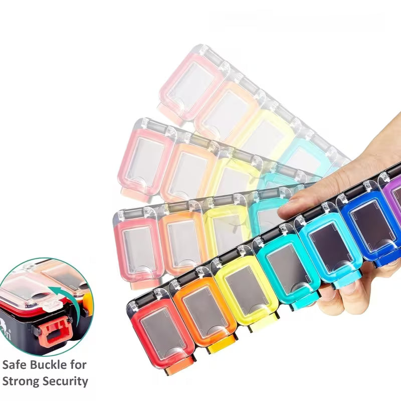 Colorful keychains with a hand holding one, on a white background.