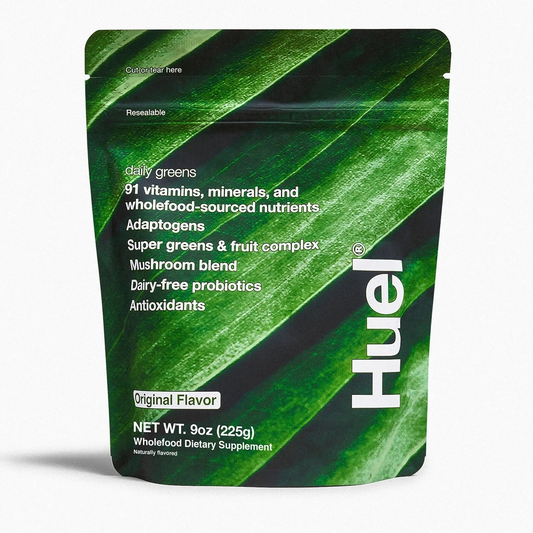 Green Huel package with leaf design on a white background