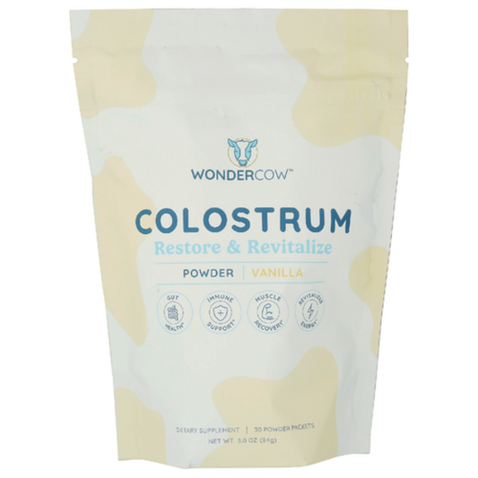 Package of WonderCow colostrum powder with vanilla flavor on a white background