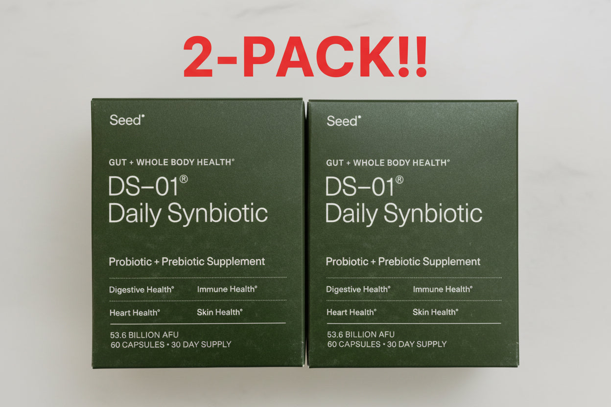 Seed DS-01 Daily Synbiotic 60 count two-pack bundle jars Supplement package for DS-01 Daily Synbiotic by Seed on a green background