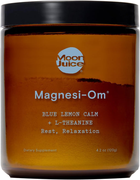 Moon Juice Magnesi-Om supplement jar with orange label and black lid.